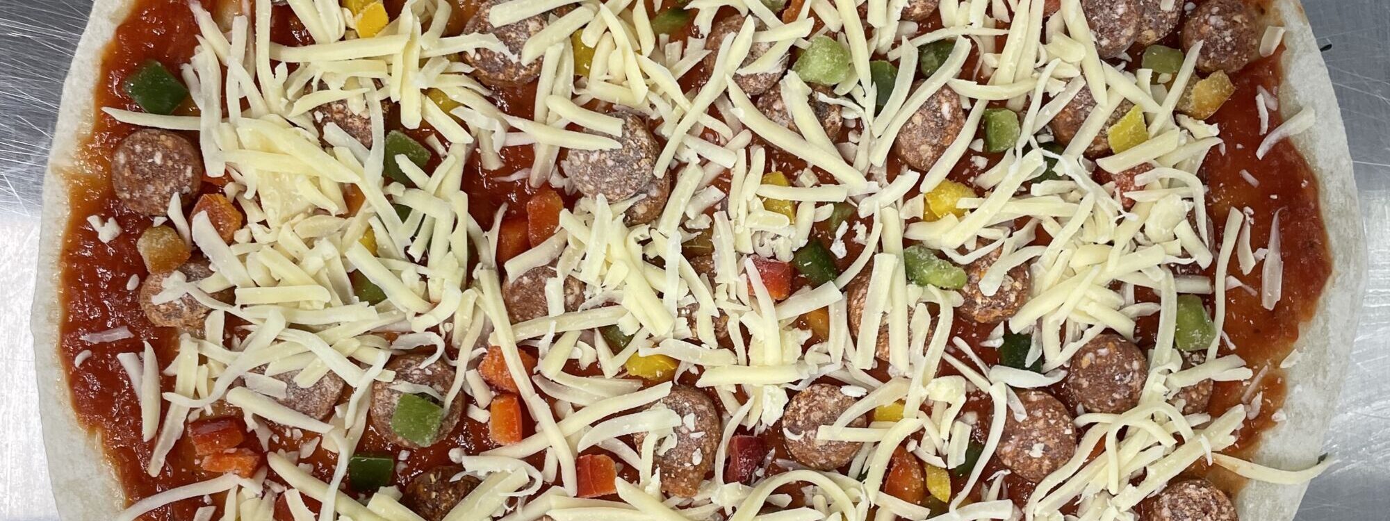 Pizza surgelée Merguez / poivrons Sélestat